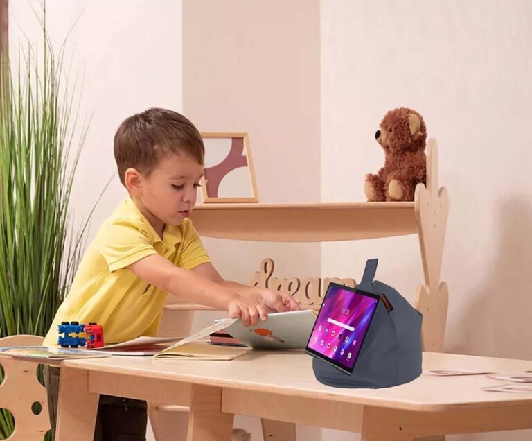 Product Description Instant Classic – A Must-Have for Every Household Tablet Holder Perfect for Kids and Adults – Comfort, Fun, and Functionality Combined Making it a fun and practical addition to group activities, while adults can enjoy hands-free usage for work or relaxation. The soft, non-slip fabric adapts to any surface, ensuring that your device stays securely in place whether on a table, your lap, or in bed. Additionally, its 100% cotton cover is easy to clean and durable enough to withstand everyday use, making it an excellent gift for tech enthusiasts or book lovers. With its thoughtful design and versatility, this product provides the perfect balance of comfort, fun, and function for everyone in the family. Whether it's for everyday use or special occasions, this versatile bean bag pillow holder is designed to fit seamlessly into any lifestyle. With its universal compatibility, it can hold a variety of devices, including tablets, iPads, phones, Readers, and even books, making it perfect for the whole family. Effortless Comfort & Versatile Support for All Your Devices Enjoy hands-free convenience with our soft, durable bean bag cushion stand. Whether you're lounging at home, traveling, or working on the go, this stand provides the perfect ergonomic support for your devices. Its adjustable design allows for different viewing angles, ensuring that you can watch movies, read, or browse the internet with ease. Universal Bean Bag Cushion Stand for Tablets, iPads, Phones, eReaders, and Books Tablet Holder Perfect for Group Play – Encourages Sharing and Togetherness Designed with children in mind, this bean bag stand is lightweight and easy to use, making it ideal for kids to enjoy hands-free entertainment. Whether they’re playing games, watching cartoons, or reading their favorite books, this cushion stand offers a safe and comfortable way to keep their devices securely in place. Tablet Holder The Perfect Gift for Any Occasion Looking for a thoughtful and practical gift? This universal pillow stand is the perfect choice for birthdays, holidays, or any special occasion. With its fun, soft design and versatile functionality, it’s a gift that anyone—whether young or old—will love and use daily. Tablet Holder Perfect for Children – Fun, Safe, and Comfortable Ideal for shared playtime, this bean bag stand allows multiple children to enjoy games, videos, or learning apps together. Its stable design keeps the device in place, making it perfect for group activities, fostering interaction, and bringing children closer during play or educational sessions. Tablet Hodler Designed for Stability – Securely Holds Your Devices The bean bag cushion provides a stable and secure base for your devices, ensuring they remain in place whether you're using it on a desk, your lap, or in bed. Its soft design conforms to any surface, offering both stability and flexibility. Product Specs/Features Product Name Tablet iPad Phone Stand Bean Bag Cushion Pillow Holder Compatibility Suitable for tablets, iPads, phones, eReaders, and books up to 12.9 inches Material Made from 100% cotton fabric for a soft and durable finish Stability Securely holds devices in place, preventing slips or falls Portability Lightweight and compact, ideal for travel, home, or office use Multi-Purpose Use Perfect for reading, browsing, video calls, or watching movies Comfort Soft bean bag cushion conforms to any surface for added support Ultimate Comfort & Stability – Bean Bag Pillow Stand for All Devices! Tablet Holder Hands-Free Convenience | Adjustable Viewing | Perfect for Travel Enjoy effortless browsing, reading, or streaming with this Tablet, iPad, and Phone Stand Bean Bag Cushion. Designed to securely hold devices up to 12.9 inches, this 100% cotton fabric stand provides adjustable viewing angles for maximum comfort. The soft yet stable bean bag base conforms to any surface, ensuring hands-free use on your bed, couch, or desk. Lightweight and portable, it's the perfect travel companion for long journeys, working from home, or relaxing with your favorite book or eReader. Stay comfortable while keeping your device securely in place!